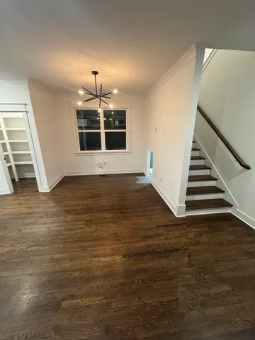 a view of a kitchen with a sink and a stove
