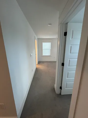 a bathroom with a shower and a toilet