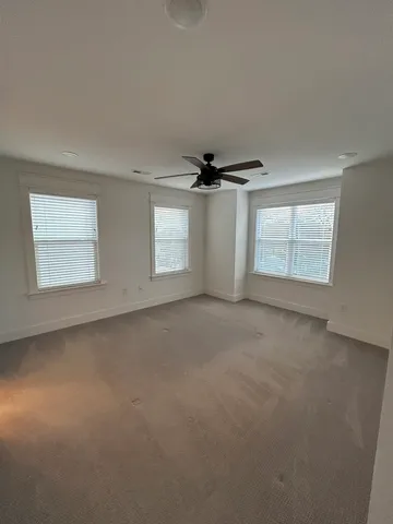 a view of an empty walk in closet