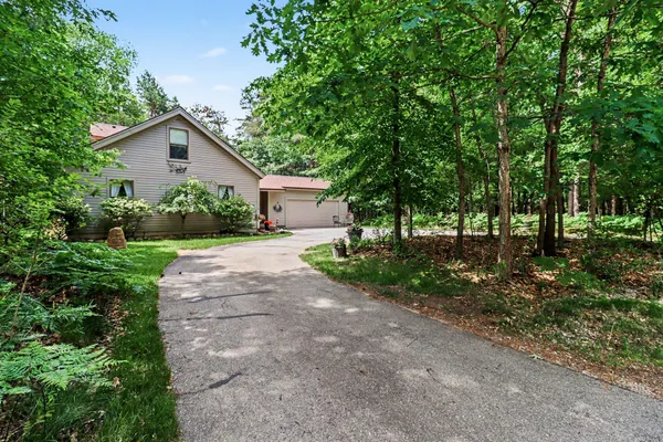 $299,900 | 10035 Hawthorne Lane, Canadian Lakes, MI 49346