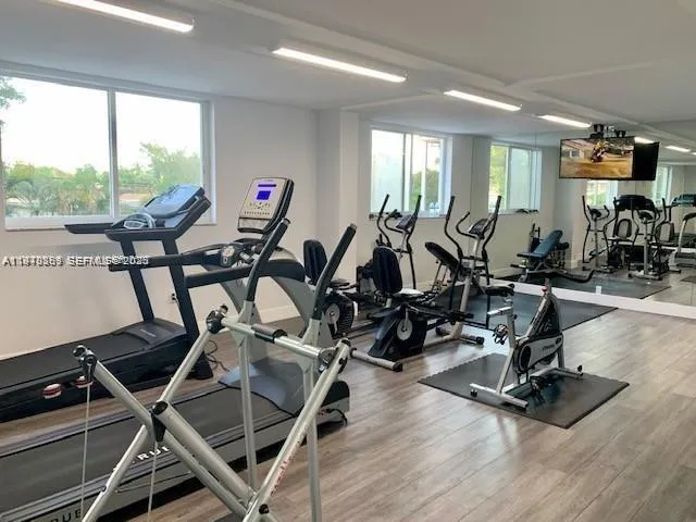 a utility room with sink dryer and washer