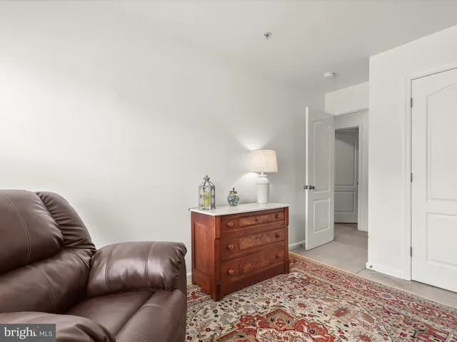 a sign that is in front of flowers