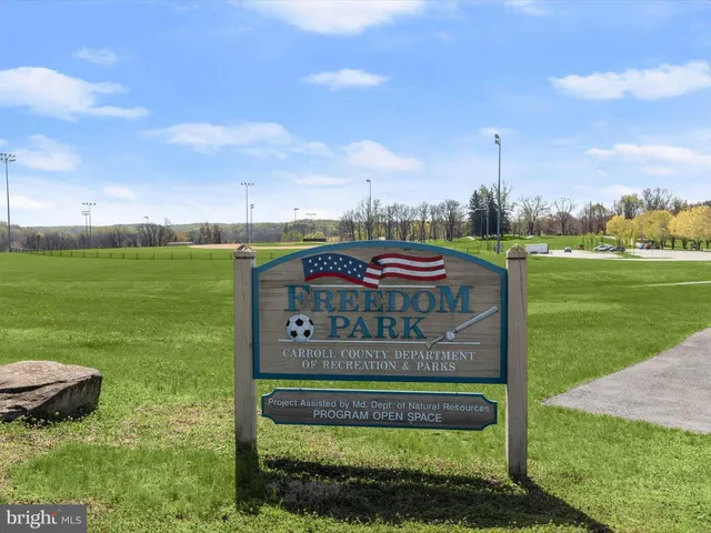 a front view of a building with garden