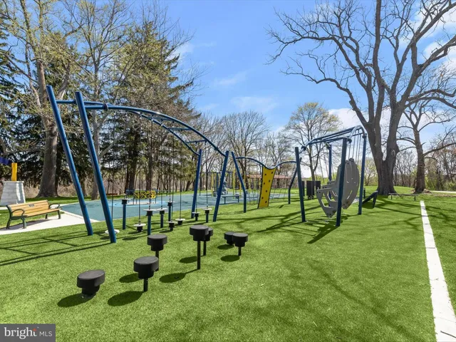 a front view of a house with white walls