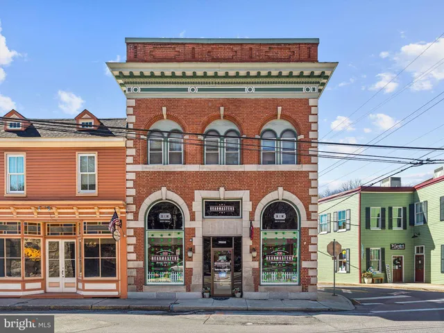 a front view of a building with street
