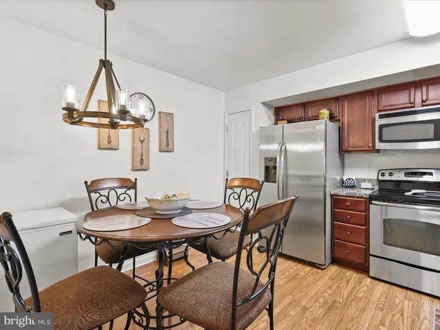 a view of a dining room with furniture