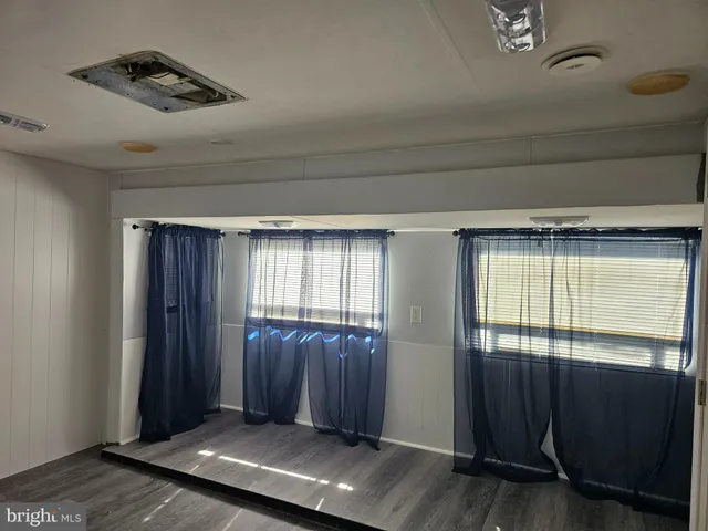 a bathroom with a shower and a toilet