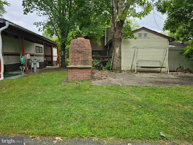 a kitchen with a sink and a refrigerator
