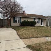 a front view of house with yard