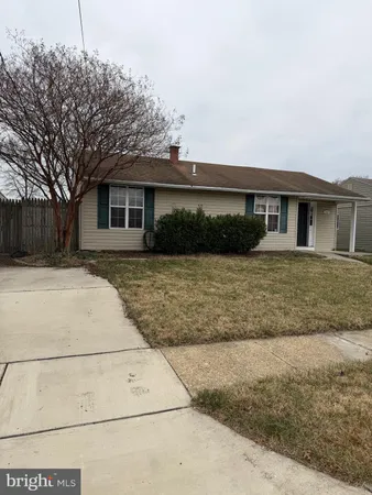 a front view of house with yard
