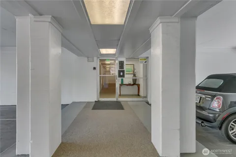 a view of a livingroom and a livingroom with furniture