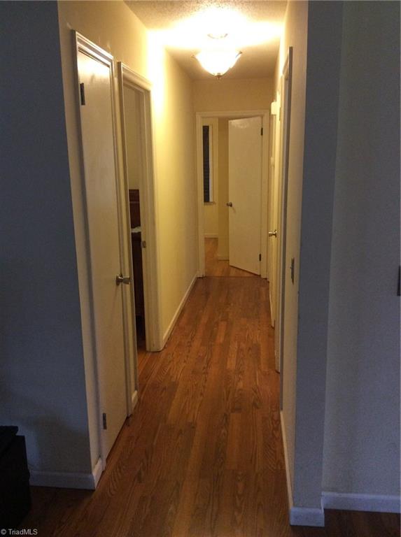 3821 Messick Road Jonesville, NC 28642 - Photo 9 of 18 Hallway leading to 3 bedrooms and hall bath
