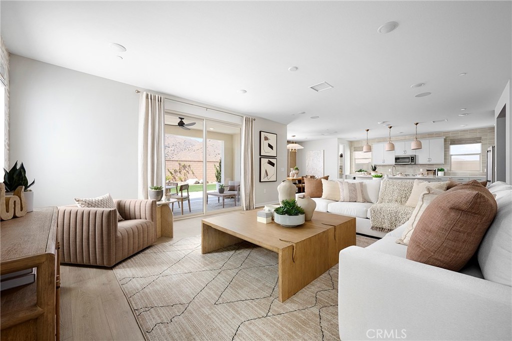 26147 Pepper Tree Ridge Road Corona, CA 92883 - Photo 4 of 14 Model Photos: Photos shown are of the model home for this floor plan. Actual finishes, features, and landscaping may vary.