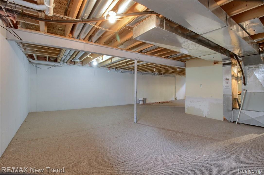 767 Woodfield Way Rochester, MI 48307 - Photo 23 of 29 23-Finished Lower Level 2nd View.jpg