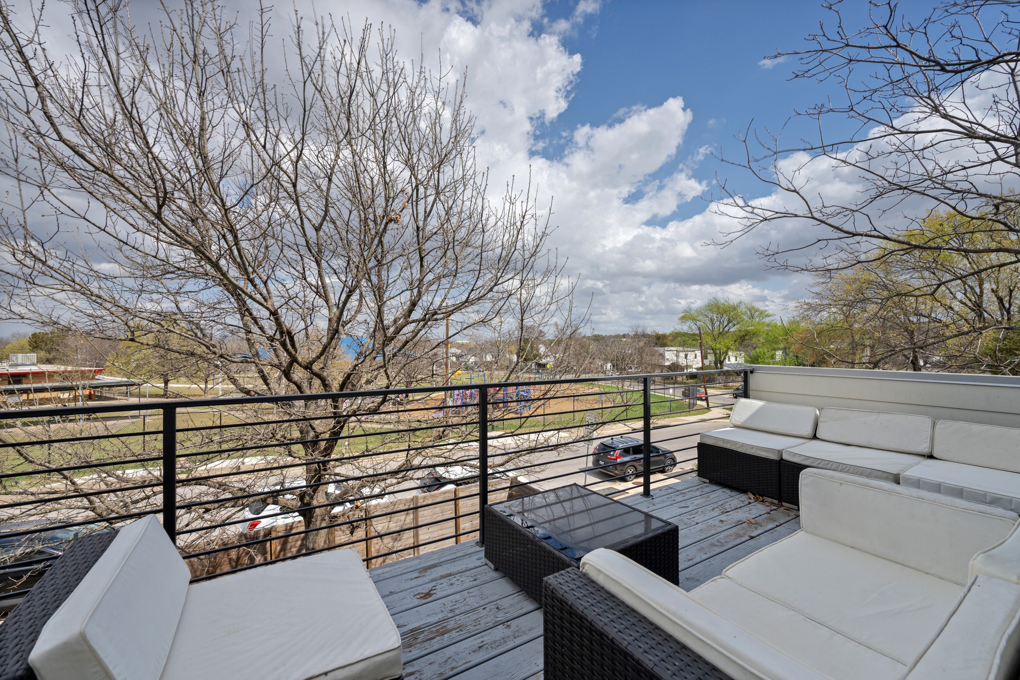 503 Havana Street, Unit A Austin, TX 78704 - Photo 16 of 28 Wooden terrace with outdoor furniture