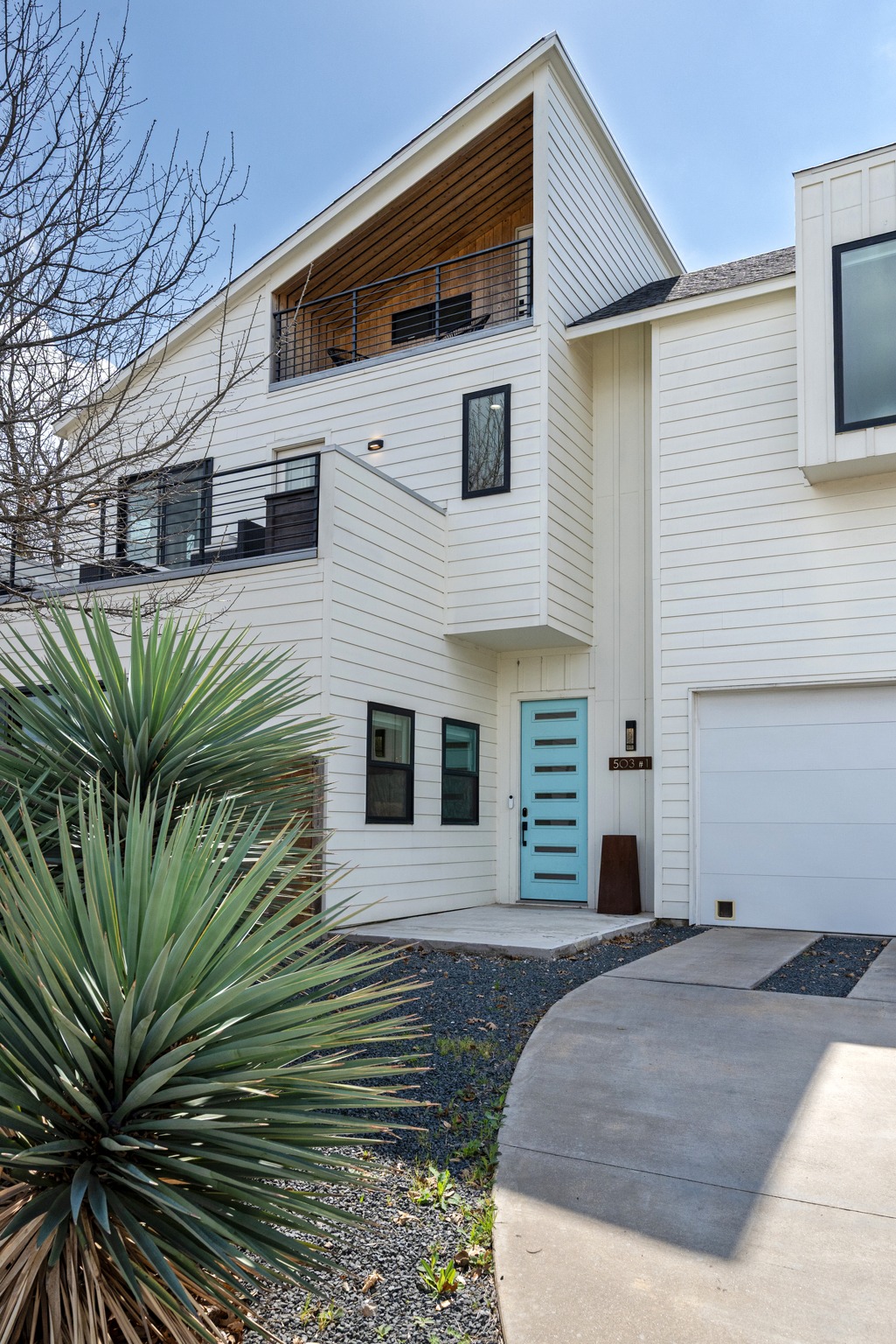 503 Havana Street, Unit A Austin, TX 78704 - Photo 27 of 28 View of front facade featuring a balcony and a garage
