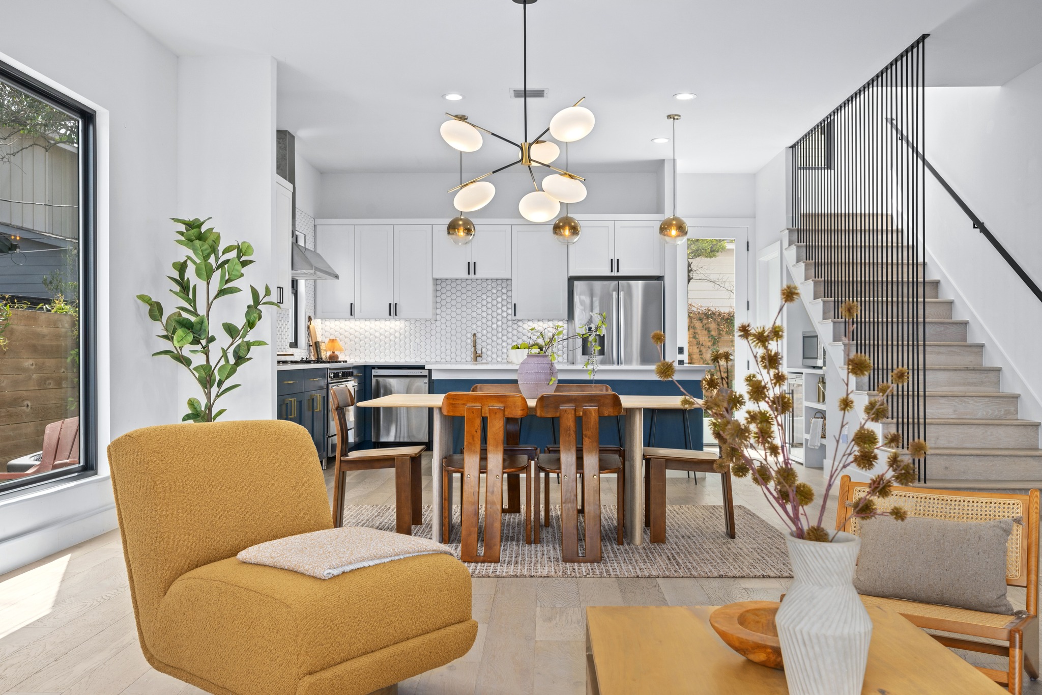 503 Havana Street, Unit A Austin, TX 78704 - Photo 6 of 28 Dining space with hanging lights and stairway