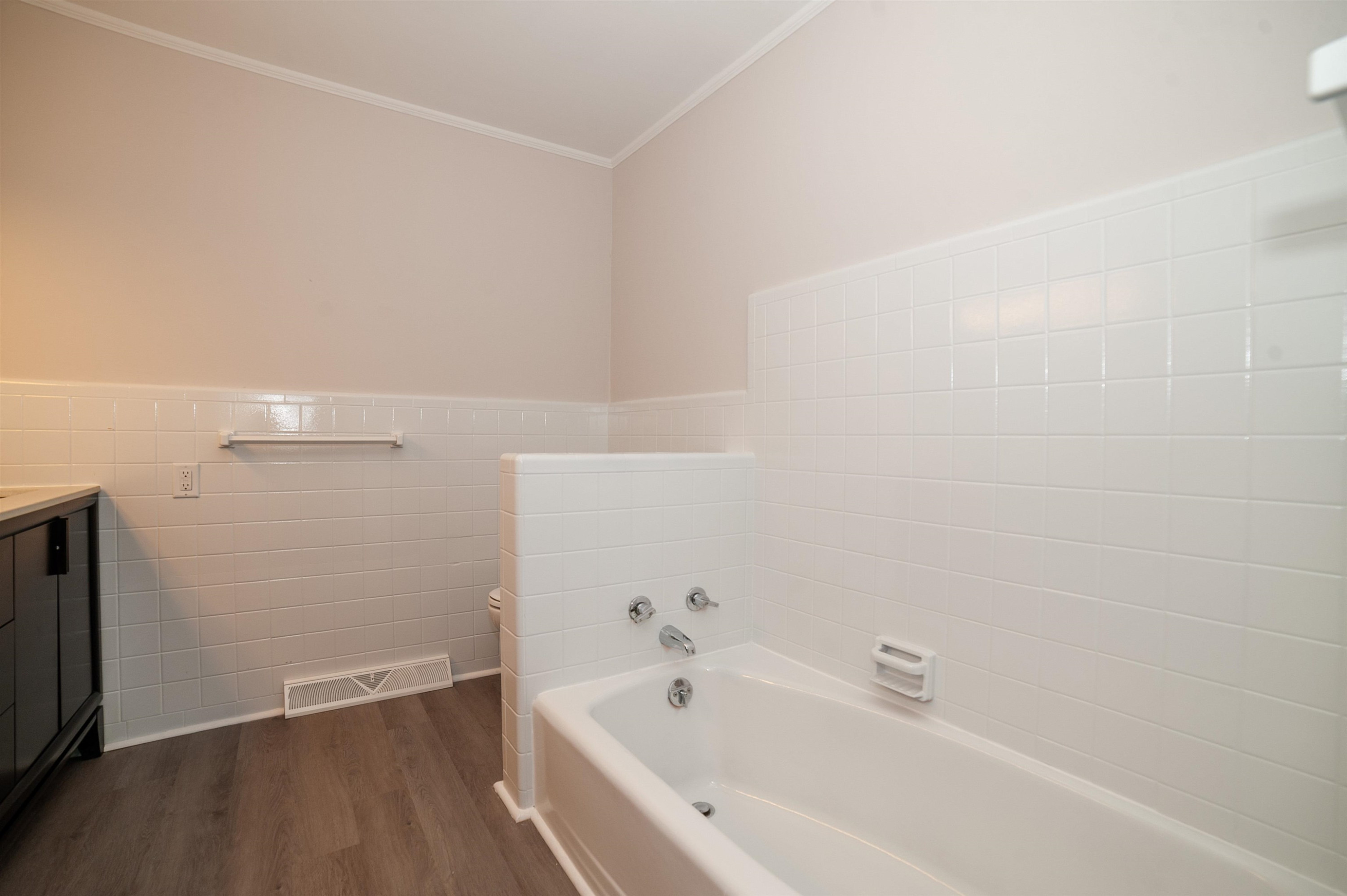 1206 Erwin Road Dunn, NC 28334 - Photo 18 of 24 a bathroom with a bathtub