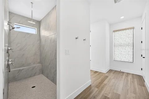 a bathroom with 2 sink and a mirror