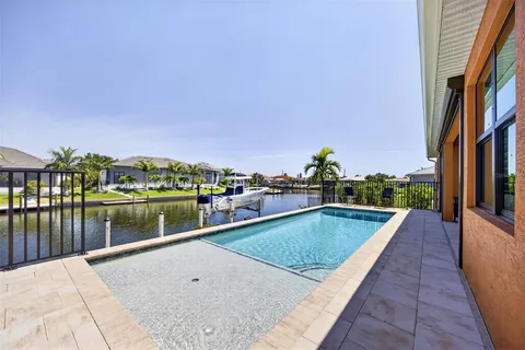 a house view with a seating space and garden