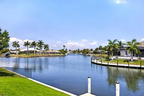 a view of a lake with a house