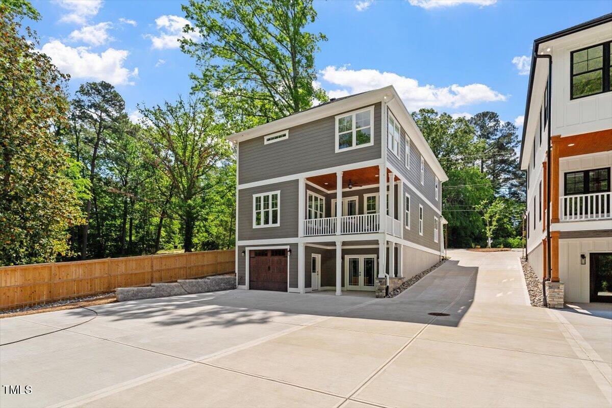 3932 Old Chapel Hill Road Durham, NC 27707 - Photo 2 of 46 a front view of a house with a yard