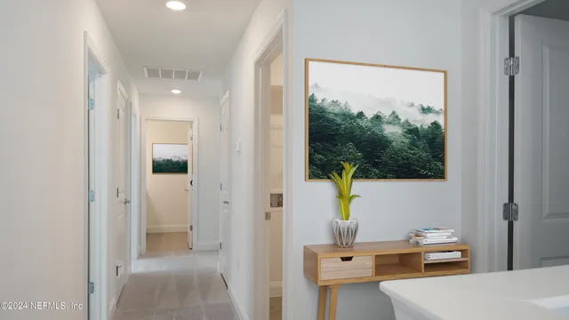 a bedroom with bed and a window