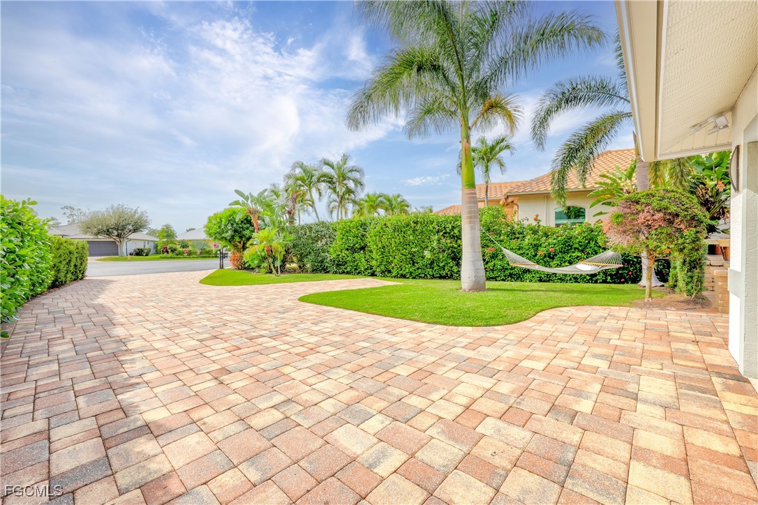 2003 Timberline Drive Naples, FL 34109 - Photo 15 of 44 a view of a park with plants and palm trees