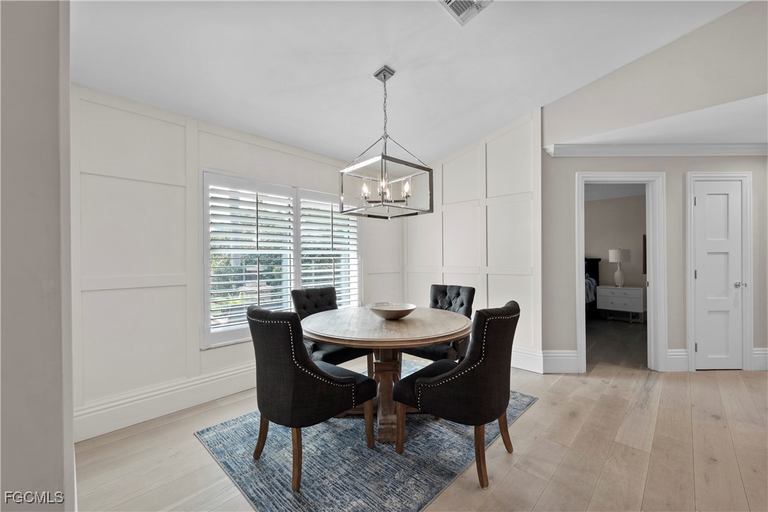 2003 Timberline Drive Naples, FL 34109 - Photo 19 of 44 a dining room with furniture and window
