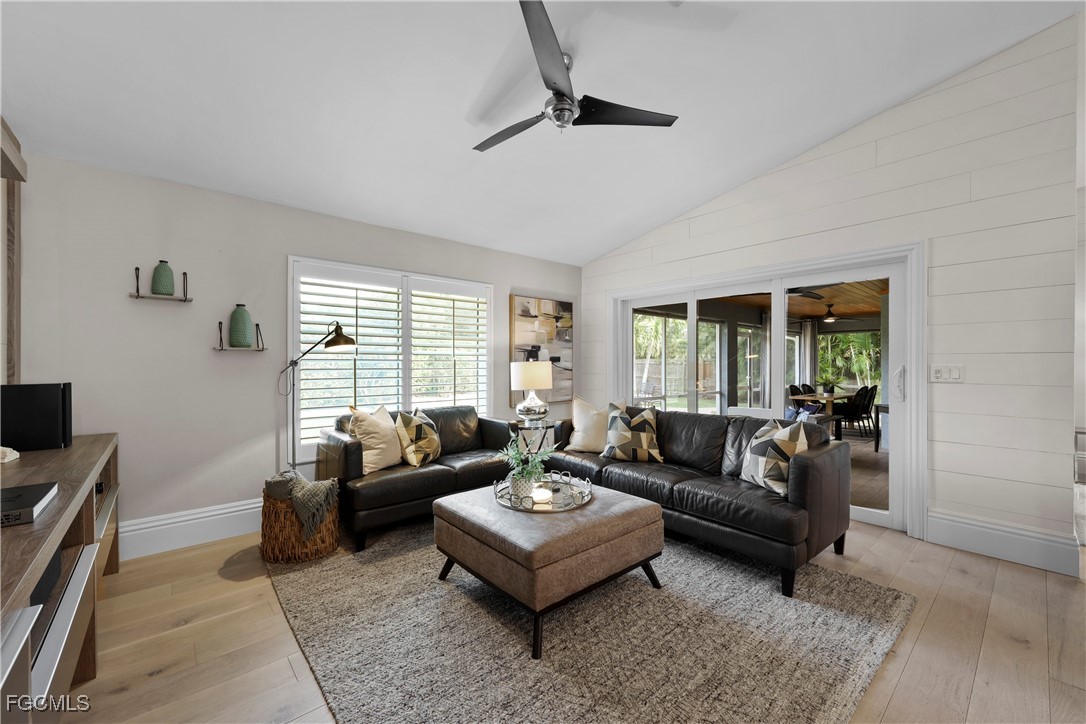 2003 Timberline Drive Naples, FL 34109 - Photo 20 of 44 a living room with furniture and a window
