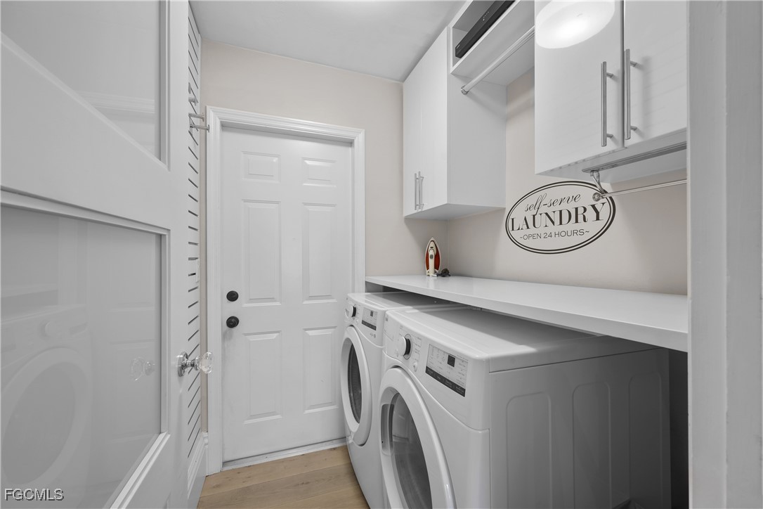 2003 Timberline Drive Naples, FL 34109 - Photo 35 of 44 a utility room with dryer and washer