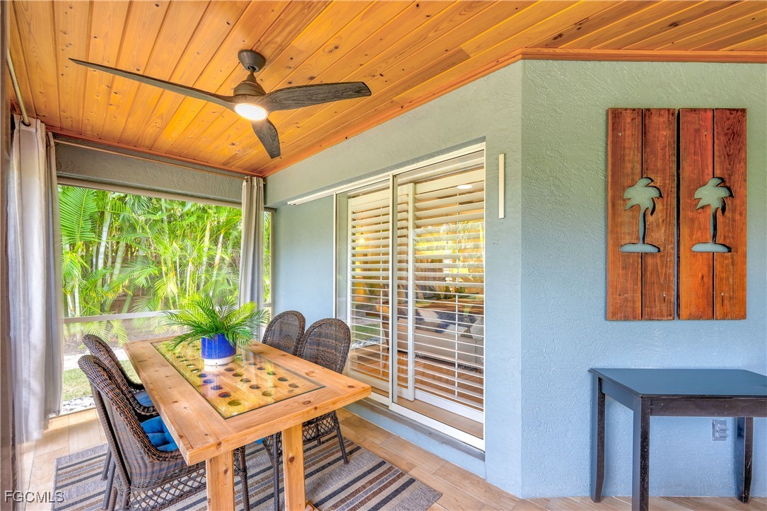 2003 Timberline Drive Naples, FL 34109 - Photo 37 of 44 a view of a dining room with furniture window and outside view