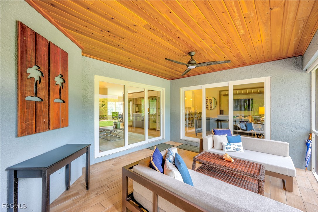 2003 Timberline Drive Naples, FL 34109 - Photo 38 of 44 a living room with furniture and a large window