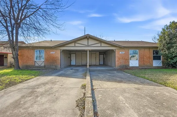 front view of a house and a yard