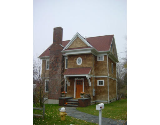 24 Willow Road Marblehead, MA 01945 - Photo 1 of 1 a front view of a house with garden