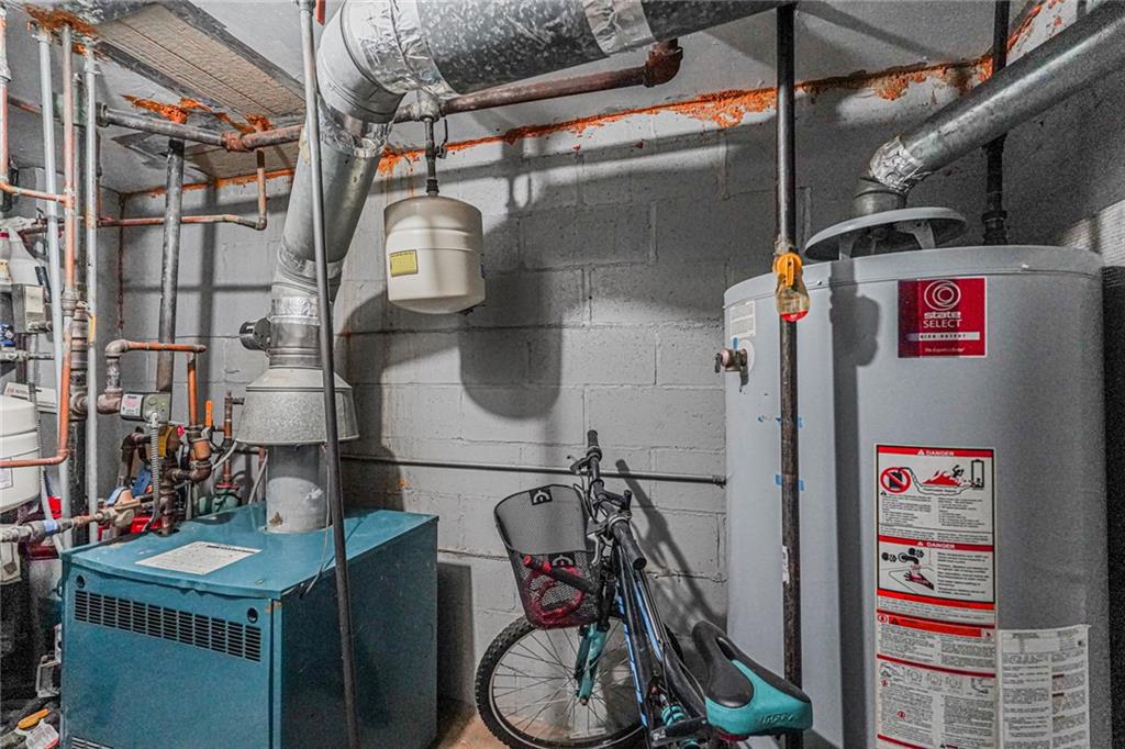 217 Brighton 1st Lane Brooklyn, NY 11235 - Photo 20 of 24 a storage utility room