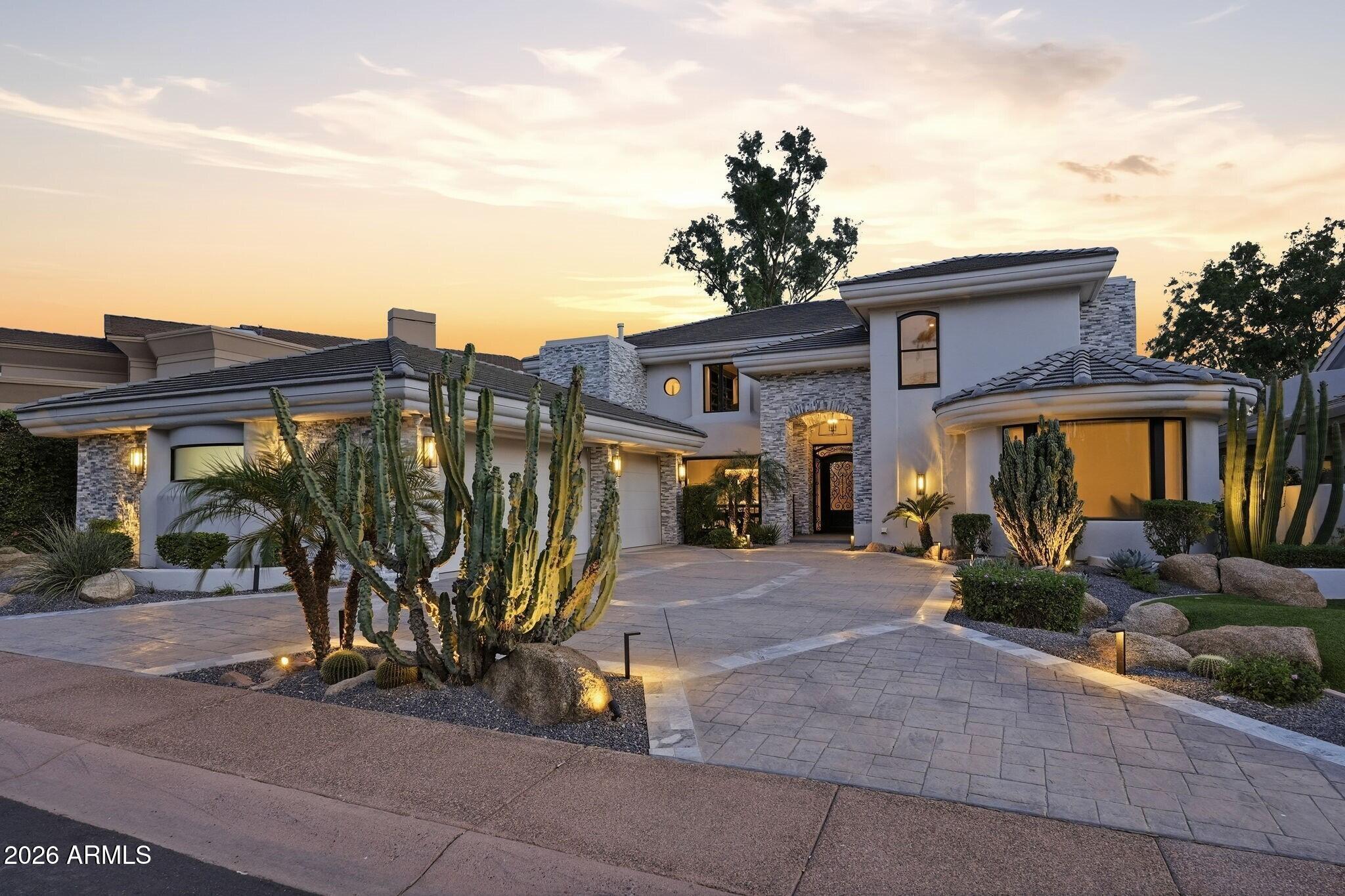 7475 East Gainey Ranch Road, Unit 7 Scottsdale, AZ 85258 - Photo 12 of 77 a view of a house with patio