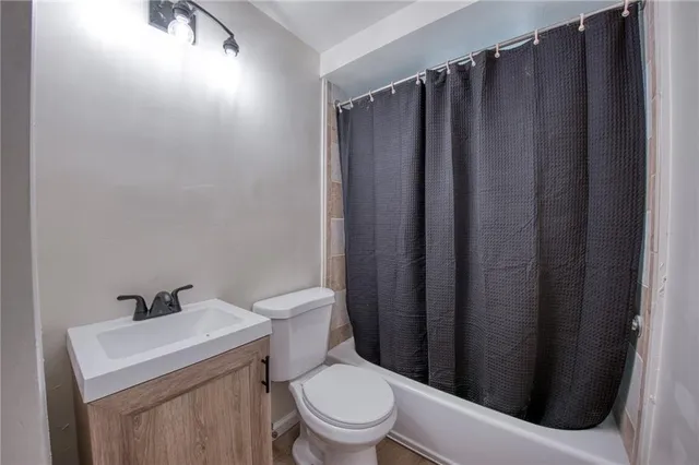 a bathroom with a sink and a toilet