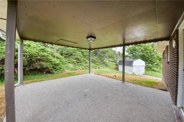 a view of a room with porch and outdoor space