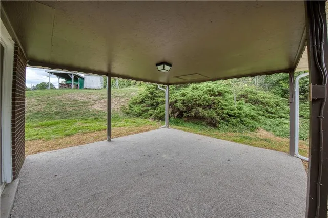 a view of a garden with an outdoor space