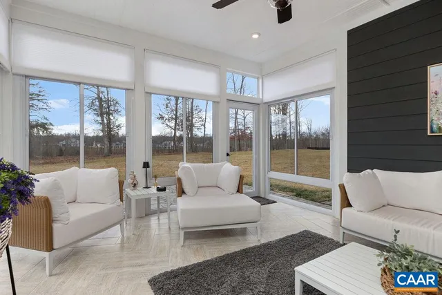 a large kitchen with a table and chairs
