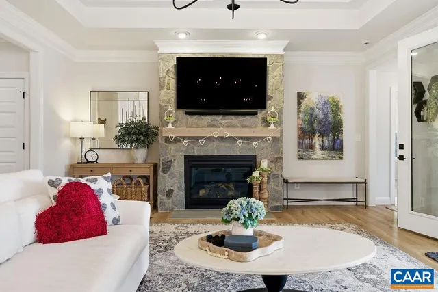 a spacious bedroom with a bed and a dresser