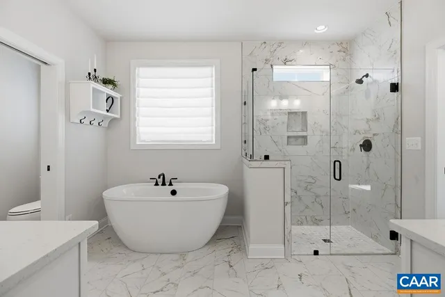 a living room with furniture and windows