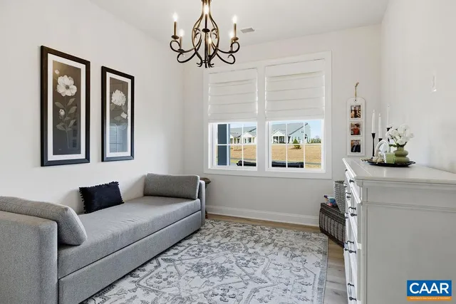 a view of workspace with wooden floor and chair