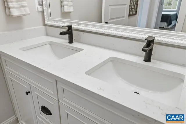 a view of a swimming pool with sitting area