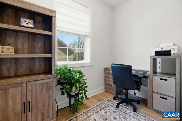 a view of a swimming pool with a yard and mountain view