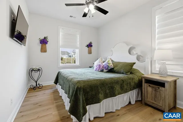 a view of a swimming pool with a yard