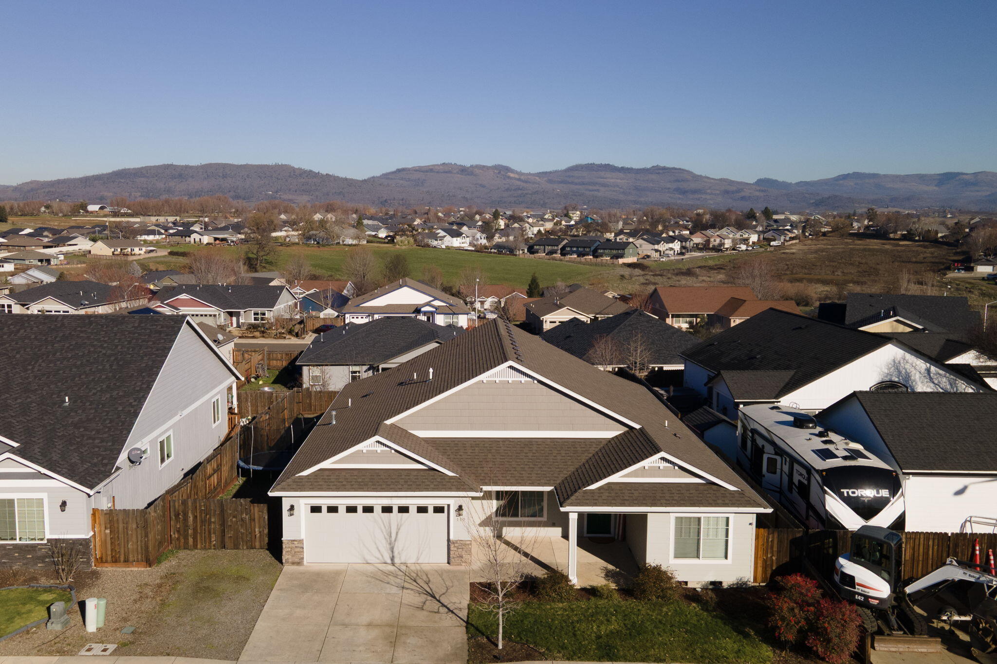 110 Linton Way Eagle Point, OR 97524 - Photo 40 of 41 an aerial view of a house with a lake view