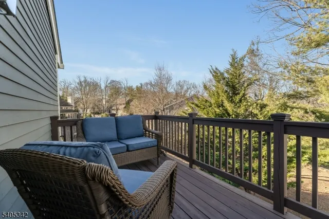 a balcony with wooden floor
