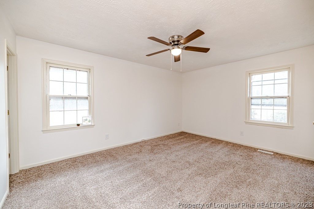 634 Richmond Road Rockingham, NC 28379 - Photo 15 of 40 a view of an empty room with a window